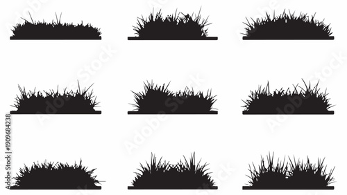 Collection of black silhouettes of grass clumps on a white background.