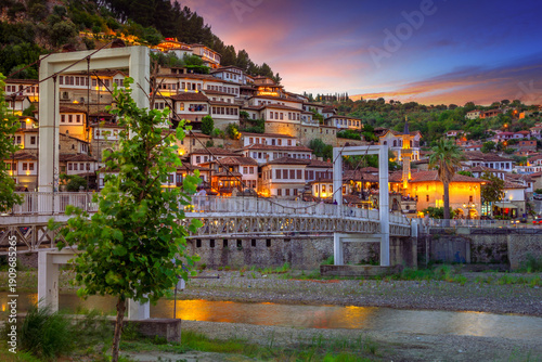 Historical Ottoman Houses in neighborhoods Gorica and Mangalem in Berat, with bridges over river Osum, Albania.