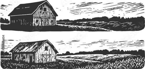 Vintage rustic barns standing in open fields with rolling hills and dramatic skies