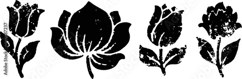 Set of black floral silhouettes including roses and a lotus flower design elements
