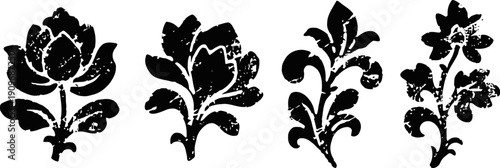 four black floral ornamental design silhouettes with intricate leaf and petal shapes