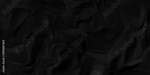 Crumple crushed black paper obsolete rumple craft design. wrinkle ripped creased crumple aged closeup recycled document grunge paper background.