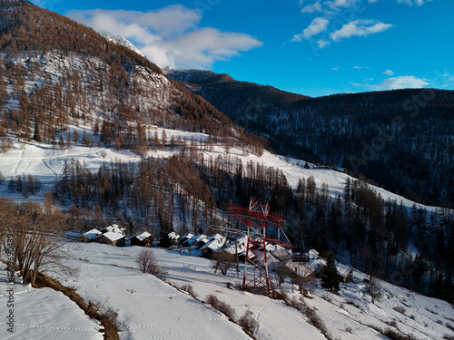 Wallpaper Mural cableway cable car in Chamois alpine village aerial view in winter season Torontodigital.ca