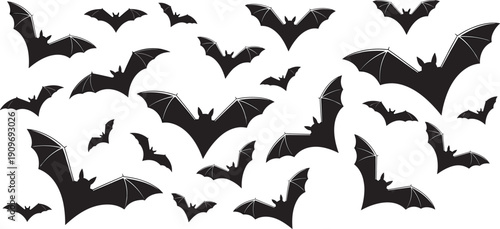 "A stylish young South Asian man wearing a crimson oversized COOL graphic t-shirt and black pants sitting casually on a metal railing in a sunny park"