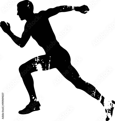 Silhouette of a male sprinter in full stride starting a race, athletic running concept