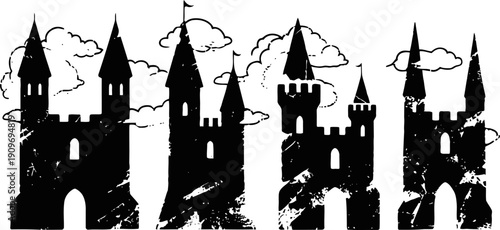 Silhouettes of medieval castles with towers and battlements under cloudy sky