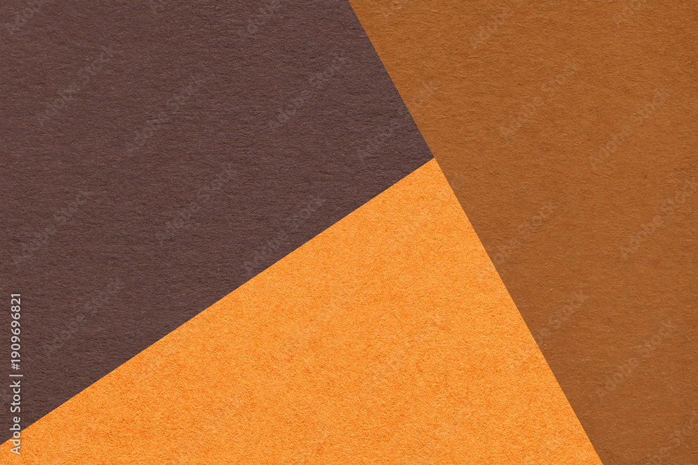 Fototapeta premium Geometric triangular dark brown orange rust textured paper background with copy space for banner template