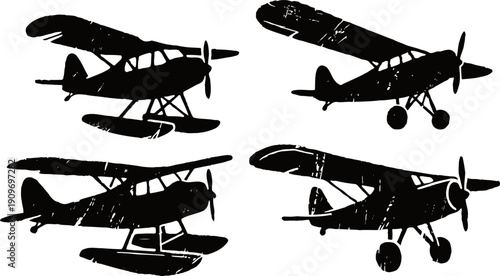 Silhouette of vintage small airplanes set with floats and wheels isolated on white background