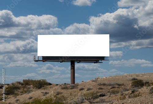 Blank billboard in desert