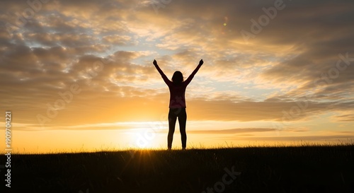 Wallpaper Mural Silhouette of a triumphant woman standing against a golden sunset sky, perfect for International Women's Day themes of leadership, bravery, and personal growth Torontodigital.ca