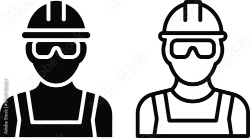 Two construction workers wearing safety helmets and goggles standing side by side