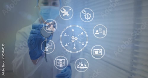 Doctor holding stethoscope starting gear icon sending nodes HUD forming ring mapping healthcare