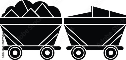 Two black mine carts filled with rock and ore a striking silhouette