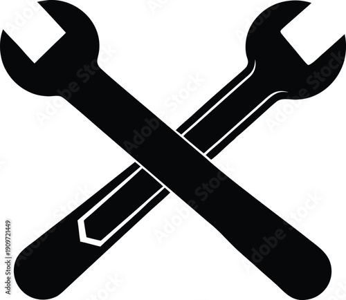 Two crossed wrenches depicted in a stark black graphic a tool silhouette