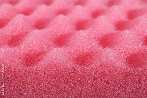 Pink acoustic foam showing soft and absorbent bubbly texture