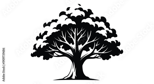 Monumental Oak Silhouette: A majestic oak tree stands tall, its silhouette a testament to the enduring beauty and strength of nature. Its intricate branches reach towards the sky.