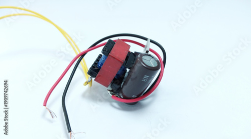 Inverter electronic components in small-scale solar power source assembly