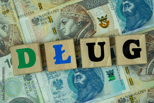 Photos Poles' debts: the word debt written on PLN (zloty) money