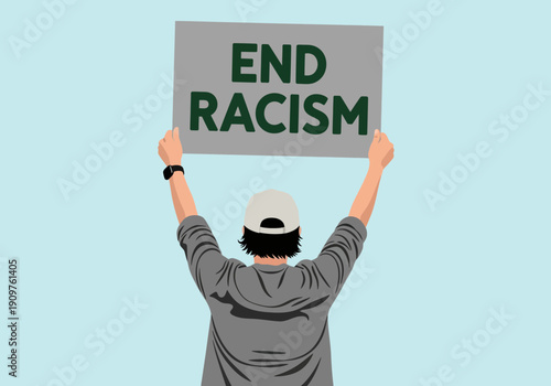 Person holding end racism sign on light blue background