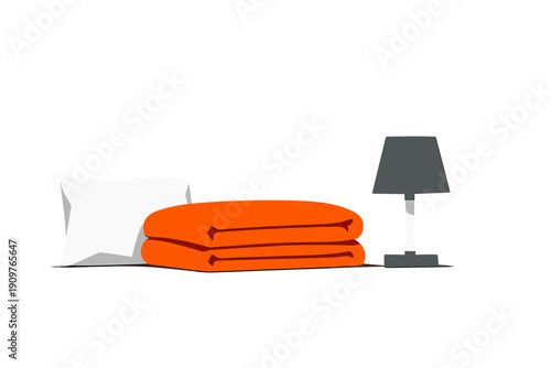 Blankets and lamp on a simple surface in a bright room with no other furniture or decorations during daylight hours