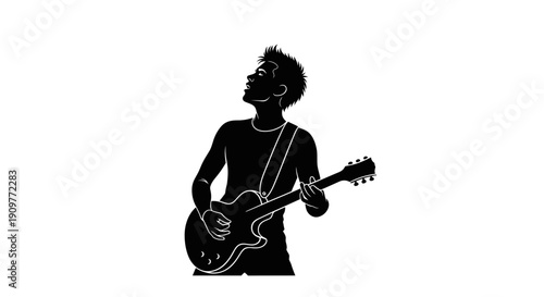 man playing guitar silhouette
