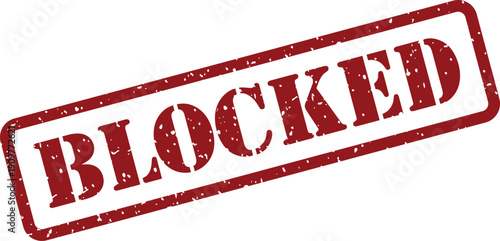 A rectangular red distressed rubber stamp with the bold word BLOCKED on a white field