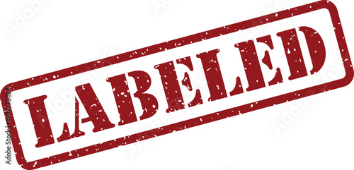 A red grunge style rubber stamp with the word LABELED printed diagonally on a bright white surface