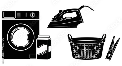 Simple black and white line art illustration depicts a household washing machine next to an empty laundry basket ready for clothes cleaning tasks inside a dark room.