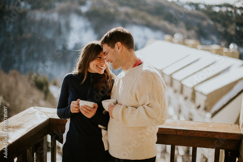 Couple enjoys warm drinks o...