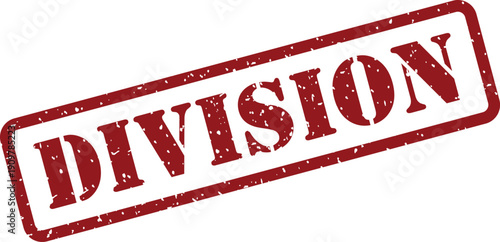 Textured red rubber stamp prominently displaying the important word DIVISION on a crisp white surface