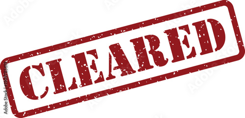 The word CLEARED appears in a distressed red rubber stamp effect, set diagonally on a pristine white surface