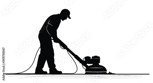 Silhouette of a worker using a floor polishing machine