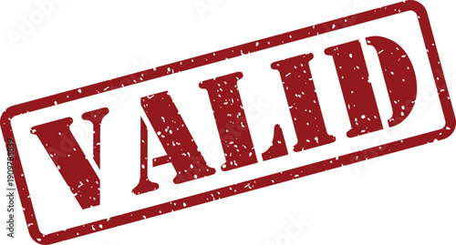 Verifying red rubber stamp impression showing the word VALID against a pristine white backdrop