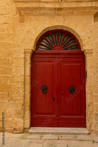 Bright red Maltese door aga...