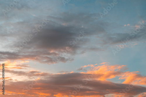 Beautiful colorful sunset with orange clouds. Sky background.