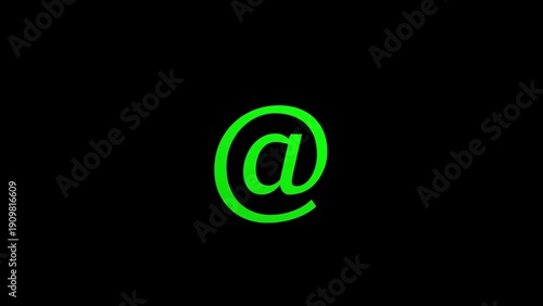Green at symbol glowing on a black background representing email and digital communication.