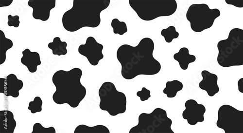 Seamless abstract black and white cow skin pattern vector illustration for animal print background and textile fabric design texture