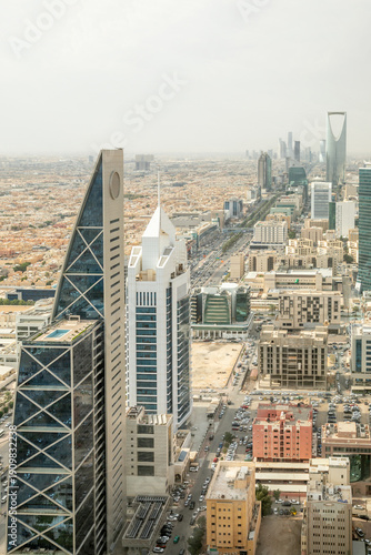 Contemporary cityscape with futuristic high rise architecture, corporate towers and dense urban downtown development representing economic wealth, Al Olaya, Riyadh, Saudi Arabia