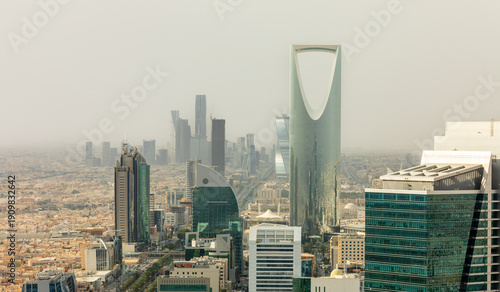 Modern cityscape with futuristic high rise architecture, corporate towers and dense urban downtown development representing economic wealth, Al Olaya, Riyadh, Saudi Arabia