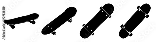 Set of four black skateboards with wheels isolated on white background minimalist design product display