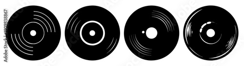 Set of four black vinyl records isolated on white background with glossy texture and retro music theme
