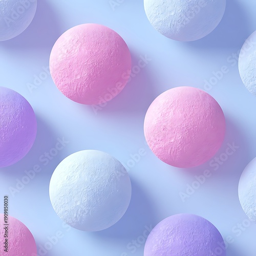 Pastel Colored Spheres on Soft Blue Background with Smooth Texture and Playful Arrangement