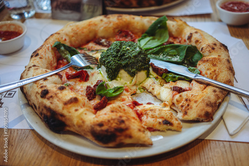 Rich Italian pizza on the restaurant table