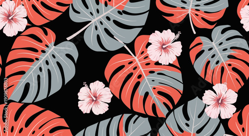 Vibrant tropical leaves and flowers pattern on a black background from an aerial viewpoint