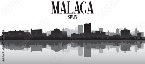 Black and white panoramic poster of the city skyline with misty background buildings and water reflection of MALAGA, SPAIN
