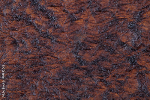 Rough brown leathery texture 