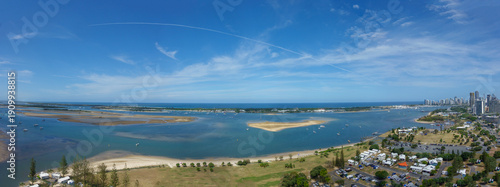 Aerial outlook across bay from Southport on Gold Coast to distant horizon