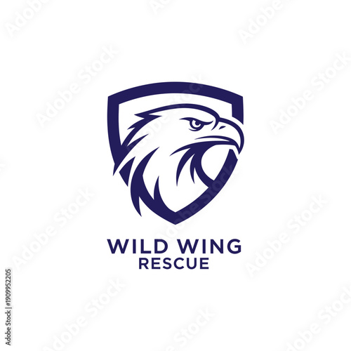 Eagle head inside shield for wildlife conservation and bird sanctuary logo branding identity for animal protection for WILD WING RESCUE