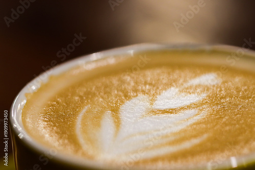 Extreme Close Up of Professional Heart Latte Art Macro, Creamy Espresso Microfoam Texture for Coffee Shop Menu, Aesthetic Barista Craftsmanship in Modern Bakery Cafe Interior