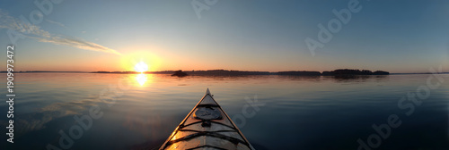 Breathtaking Kayaking Adveture: Embrace the Tranquilty and Beauty of a Sunset addle, Immersed in Nature' Splendor and the Serenityof Water Illuminated by th Golden Horizon